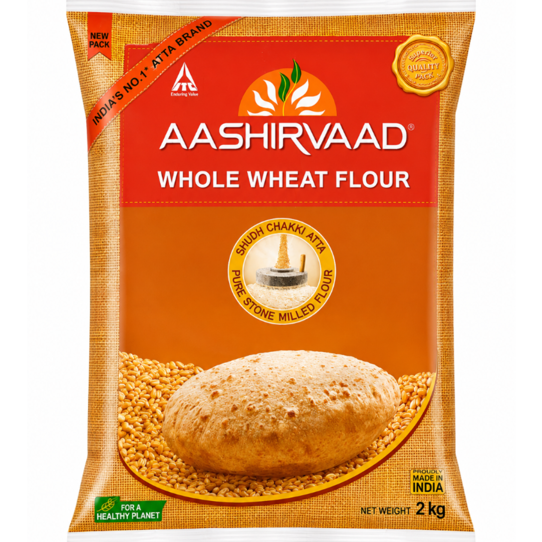 A 2 kg bag of Aashirvaad Whole Wheat Flour on a plain white background. The packaging features a bright orange and red design with a depiction of a whole wheat bread loaf and loose wheat grains.