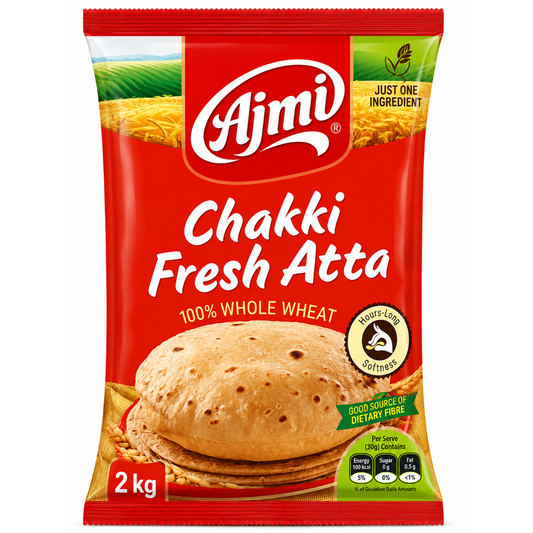 A 2 kg bag of Ajmi Chakki Fresh Atta whole wheat flour, featuring a bright red packaging design with a photo of the flattened bread and product details.