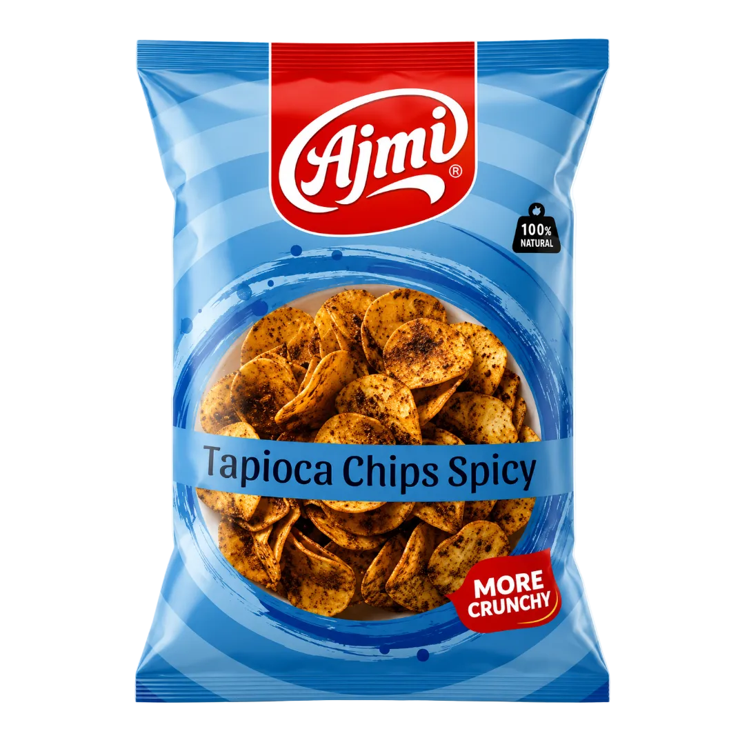 A bag of Ajmi Tapioca Chips Spicy snack, featuring blue packaging with a red Ajmi logo, a clear window showing the chips inside, and a 'MORE CRUNCHY' badge.