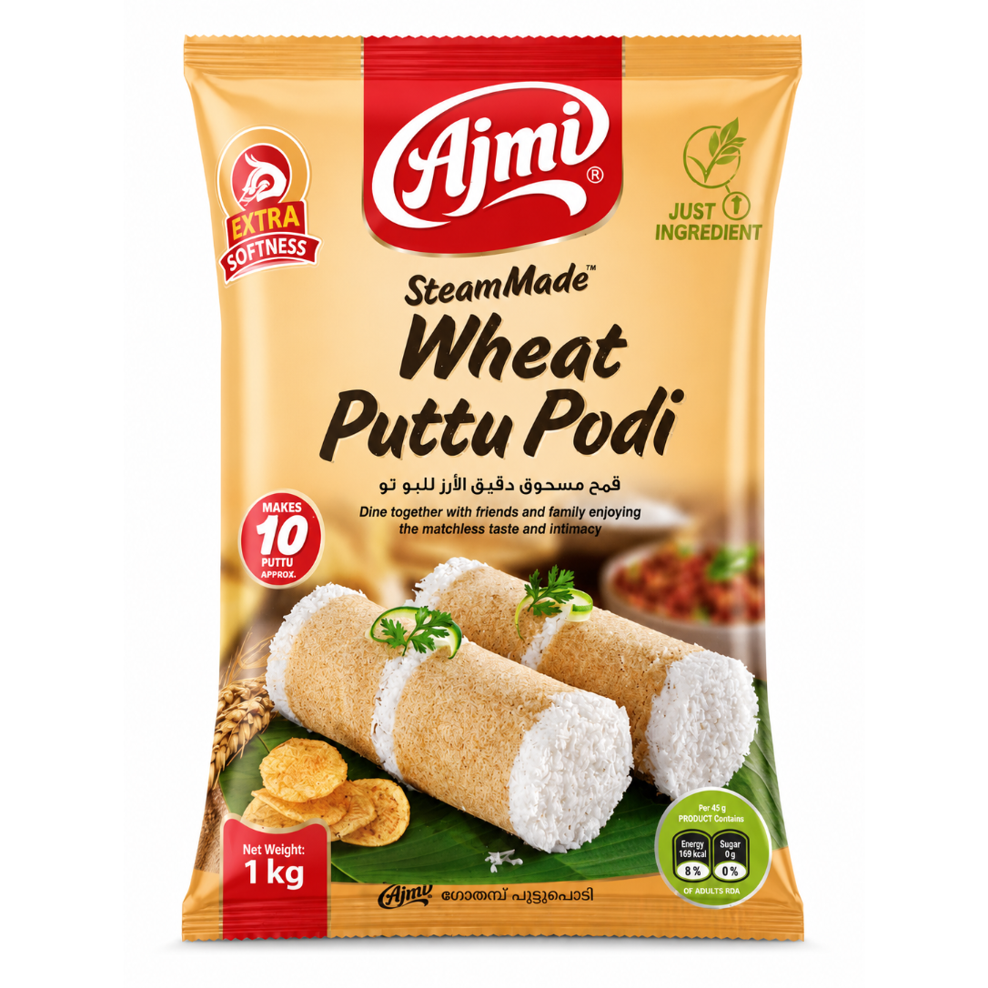 A 1 kg bag of Ajmi SteamMade Wheat Puttu Podi, featuring a golden-yellow packaging design with red and green accents, showing the prepared puttu podi rolls on the front.
