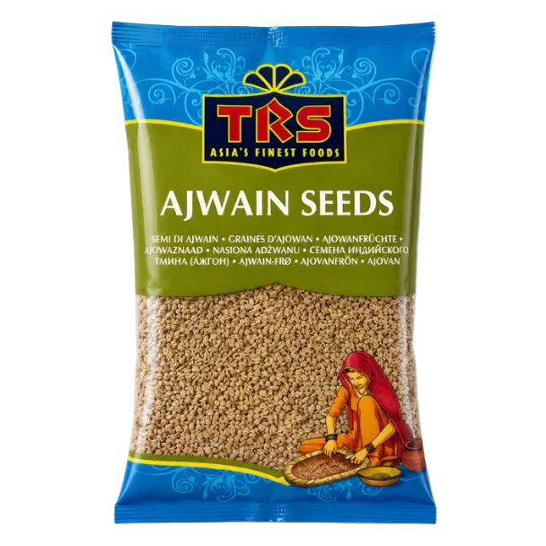 A bag of TKS Ajwain Seeds, featuring a blue and green packaging design with the brand logo and an illustration of a woman grinding the seeds.