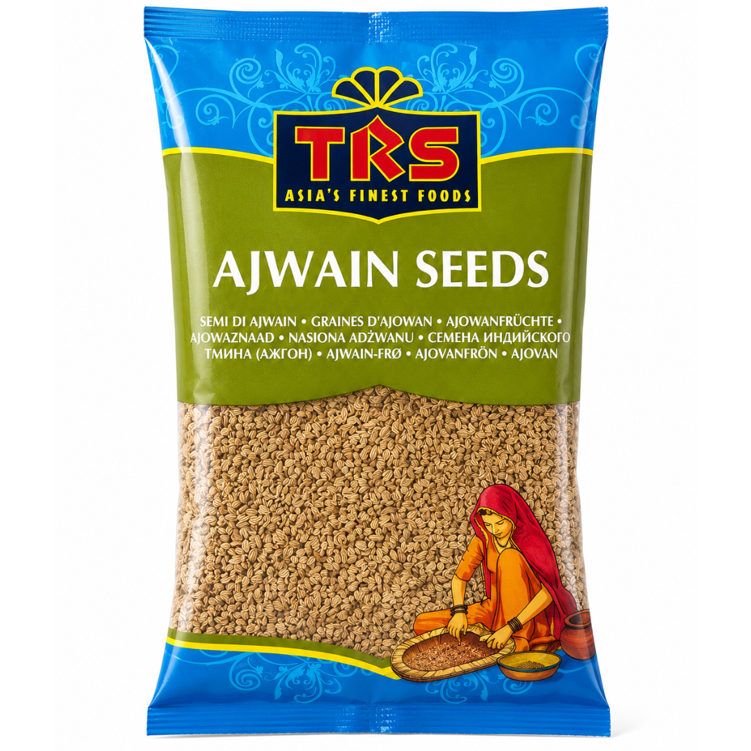 A bag of TKS Ajwain Seeds, featuring a blue and green packaging design with the brand logo and an illustration of a woman grinding the seeds.