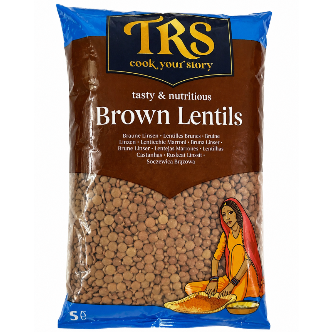 A 500g bag of TRS Brown Lentils on a plain white background. The packaging features a brown and blue design with the TRS logo in gold, and an illustration of a woman in traditional attire in the bottom right corner.