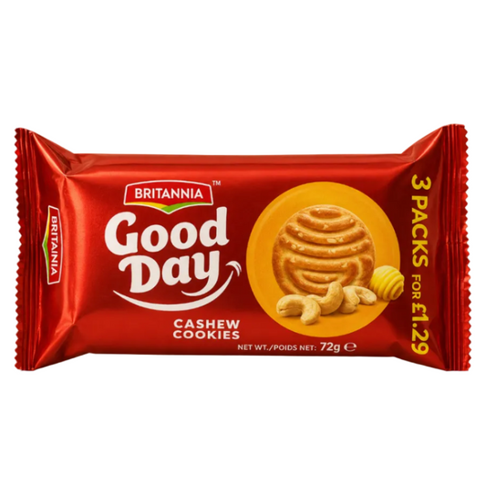 A pack of Britannia Good Day Cashew Cookies in a metallic red wrapper with a circular cookie illustration and cashew imagery, photographed on a plain light beige background.