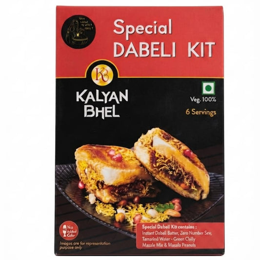 Kalyan Bhel Special Dabeli Kit in a rectangular box with a red and black design, featuring a photo of stuffed bread rolls on the front, set against a plain white background.