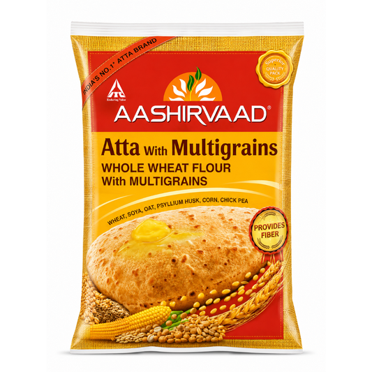 Aashirvaad Atta With Multigrains whole wheat flour in a gold and red bag, featuring a photo of a flatbread with butter and grains at the bottom.