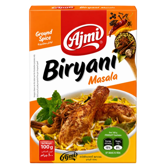 A box of Ajmi Biryani Masala ground spice mix, featuring a vibrant orange and white packaging design with a photo of a prepared biryani dish on the front.