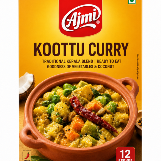 A box of Ajmi Koottu Curry, featuring a bright yellow-orange background with the red Ajmi logo at the top. The front of the packaging displays a photo of a prepared curry in a terracotta pot, with text indicating it is a traditional Kerala blend and suitable for 12 serves.