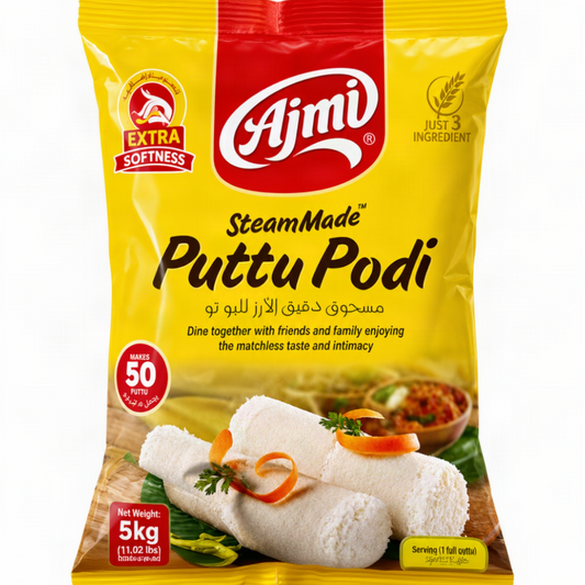 A 5kg package of Ajmi SteamMade Puttu Podi, featuring a bright yellow and red bag with a photo of white steamed rolls on the front, set against a plain white background.