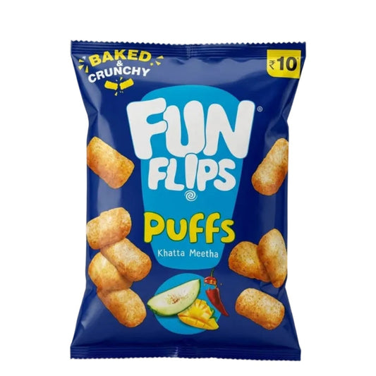 A bag of Fun Flips Puffs Khatta Meetha baked crunchy puffs, featuring a dark blue packaging with illustrations of golden-brown puffs and small food icons, set against a light gray background.