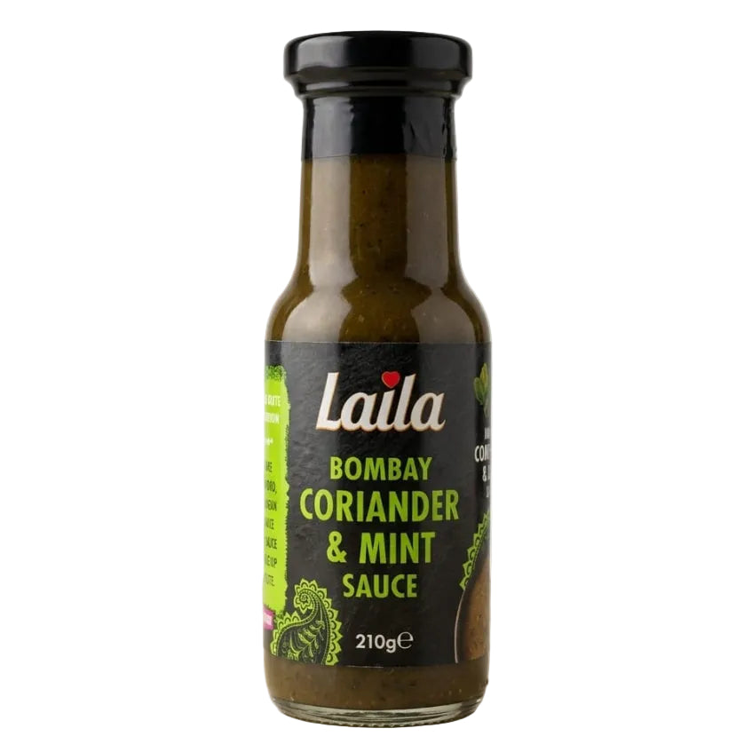 A bottle of Laila Bombay Coriander & Mint Sauce on a light beige surface against a neutral light gray background.