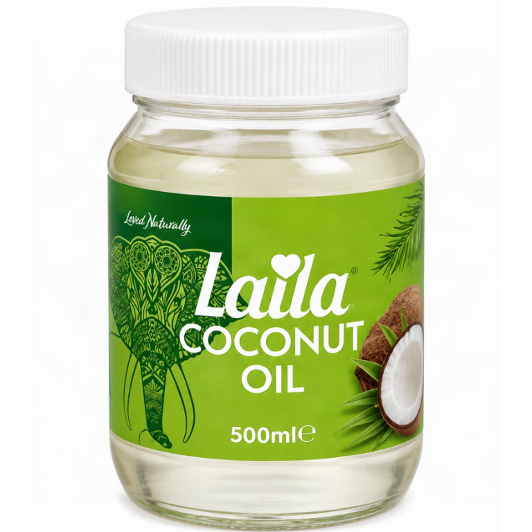 A 500ml glass jar of Laila Coconut Oil with a white ribbed cap and a bright green label featuring an elephant illustration and coconut graphics.