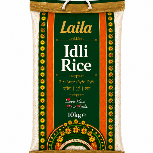 A 10kg bag of Laila Idli Rice on a plain white background. The packaging features a dark green central label with gold and white text, flanked by vertical bands of green, gold, and white patterned borders, with a white hanging loop at the top.