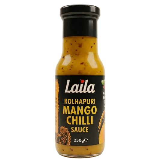 A bottle of Laila Kolhapuri Mango Chilli Sauce on a clean white background. The glass bottle shows the golden-orange sauce inside, with a black cap and a black label featuring white and yellow text.