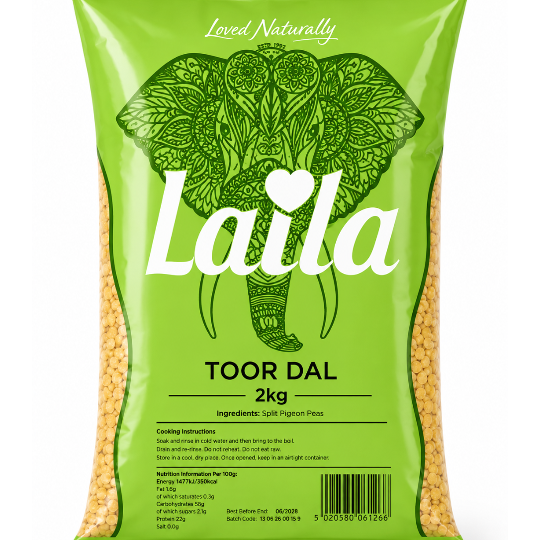 A 2kg bag of Laila Toor Dal split pigeon peas, featuring a bright green packaging design with an intricate elephant illustration and white branding text.