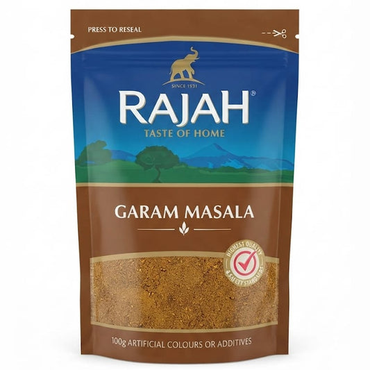 A stand-up pouch of Rajah Garam Masala spice mix on a plain white background. The packaging is brown and blue with a scenic landscape graphic, featuring the Rajah brand logo and a clear window showing the brown spice powder inside.