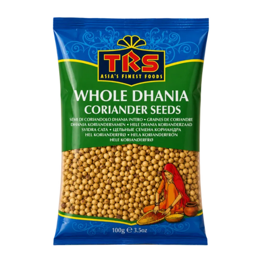 A 100g bag of TRS Whole Dhania Coriander Seeds, featuring a blue and green packaging design with a clear window showing the beige seeds inside.