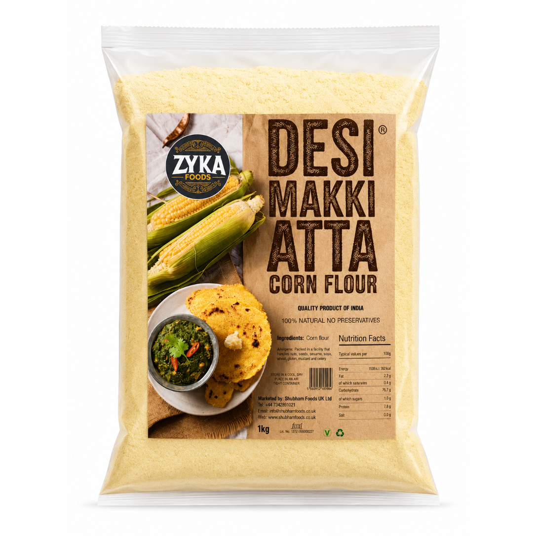 A 1kg bag of Zyka Foods Desi Makki Atta Corn Flour, featuring a clear plastic bag filled with pale yellow corn flour and a large brown paper label showing corn, flatbread, and a bowl of chutney.
